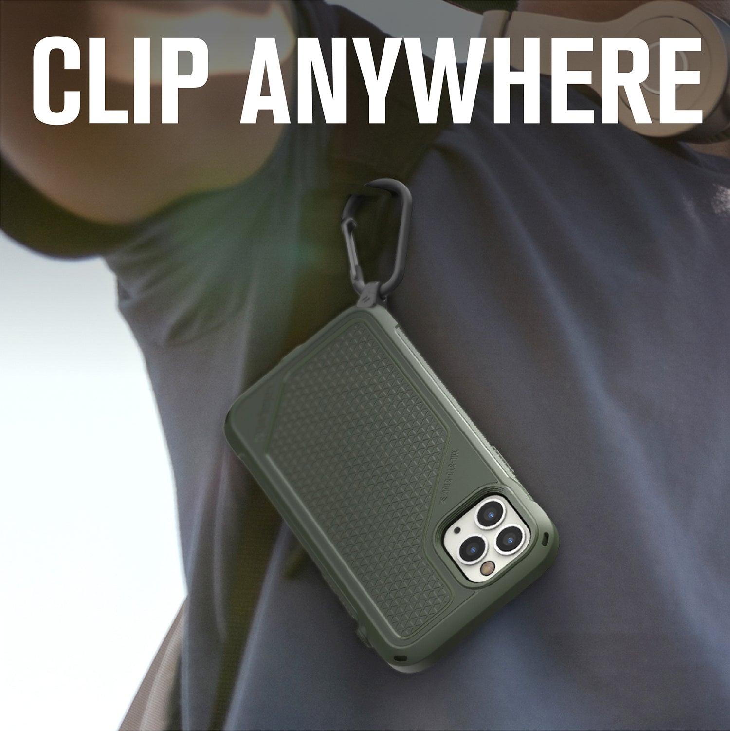Catalyst carabiner attachment attached on strap-of-a-bag-with-iPhone Text reads clip anywhere
